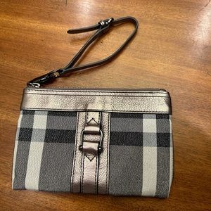 Burberry metallic wristlet. Glittery metallic cloth and leather accents.